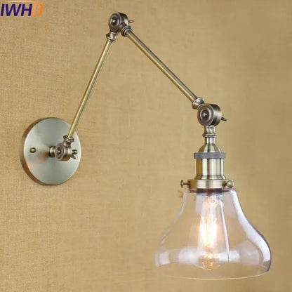 Antique brass adjustable wall lamp with clear glass bell-shaped shade and exposed filament bulb for decorbites glass swing arm use