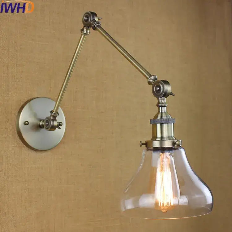Antique brass adjustable wall lamp with clear glass swing arm and exposed filament bulb for industrial decorbites style