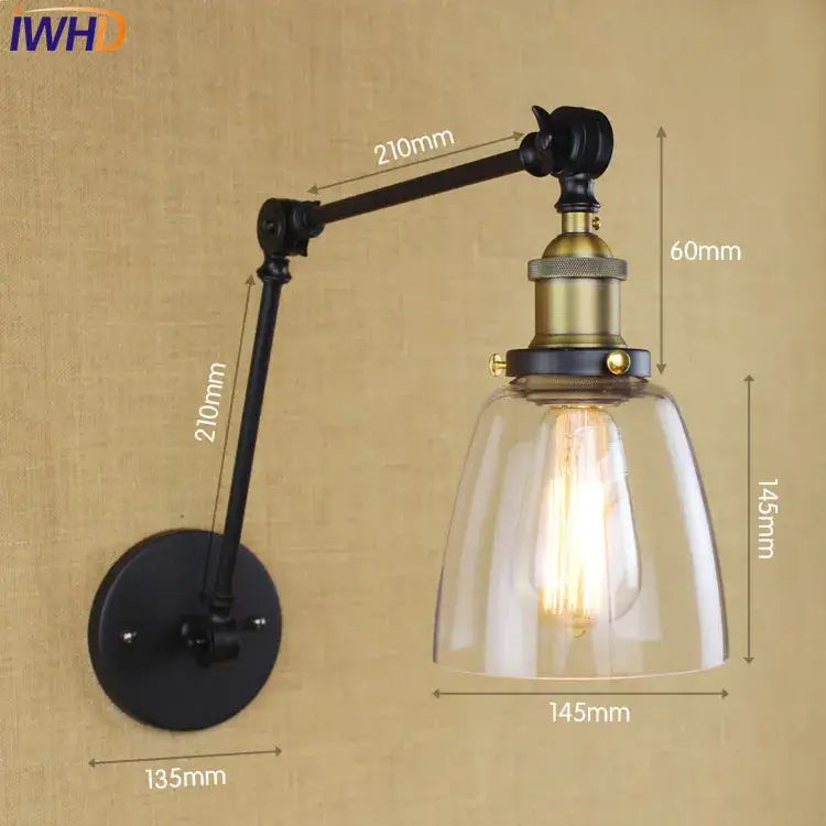 Industrial chrome glass swing arm wall lamp with black metal arm, brass accents, clear glass shade, and exposed bulb for bedroom decorbites glass swing