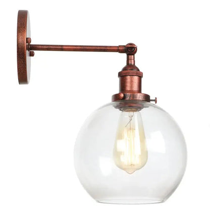 Copper-finished industrial wall sconce with decorbites glass globe and exposed filament glass globe led bulb for bedroom light