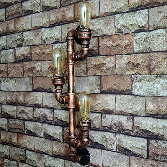 Industrial copper iron pipe wall sconce with three vintage edison bulbs for decorbites industrial iron lighting decor