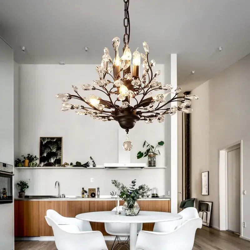 Antique bronze industrial crystal chandelier with crystal branches and dangling crystals for dining room decorbites industrial