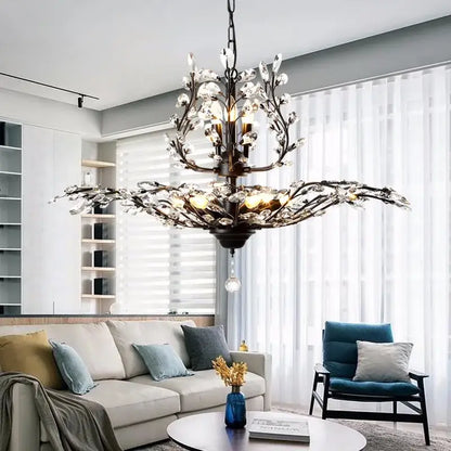 Antique bronze industrial crystal chandelier with intricate branch design and sparkling crystals for dining room decorbites industrial