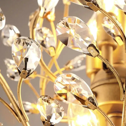 Golden industrial crystal chandelier with faceted crystal teardrop pendants in antique bronze branch design for dining room decorbites industrial crystal