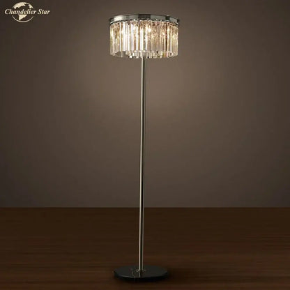 A sleek industrial crystal led floor lamp with a tall black chrome pole and circular chandelier shade for living room decorbites