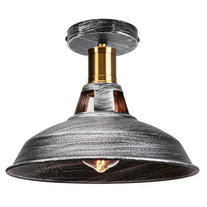 Industrial dome metal ceiling light shade with distressed metallic finish and brass accents for kitchen bar lighting