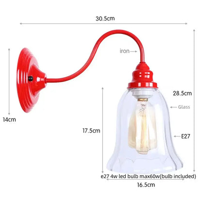 Red iron wall lamp with clear glass bell-shaped shade housing an e27 edison red led bulb vintage sconce