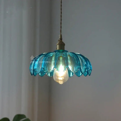 Industrial green petal glass pendant light with translucent turquoise petals and copper socket for dining room decorbites glass industrial