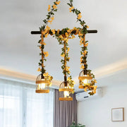 Rattan birdcage pendant light with woven industrial hemp rope and yellow floral garlands for restaurant island lighting