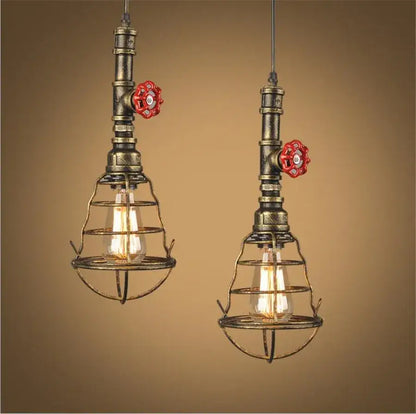 Industrial iron pipe pendant light kitchen black and brass with valve features brass-finished pipes and wire cages