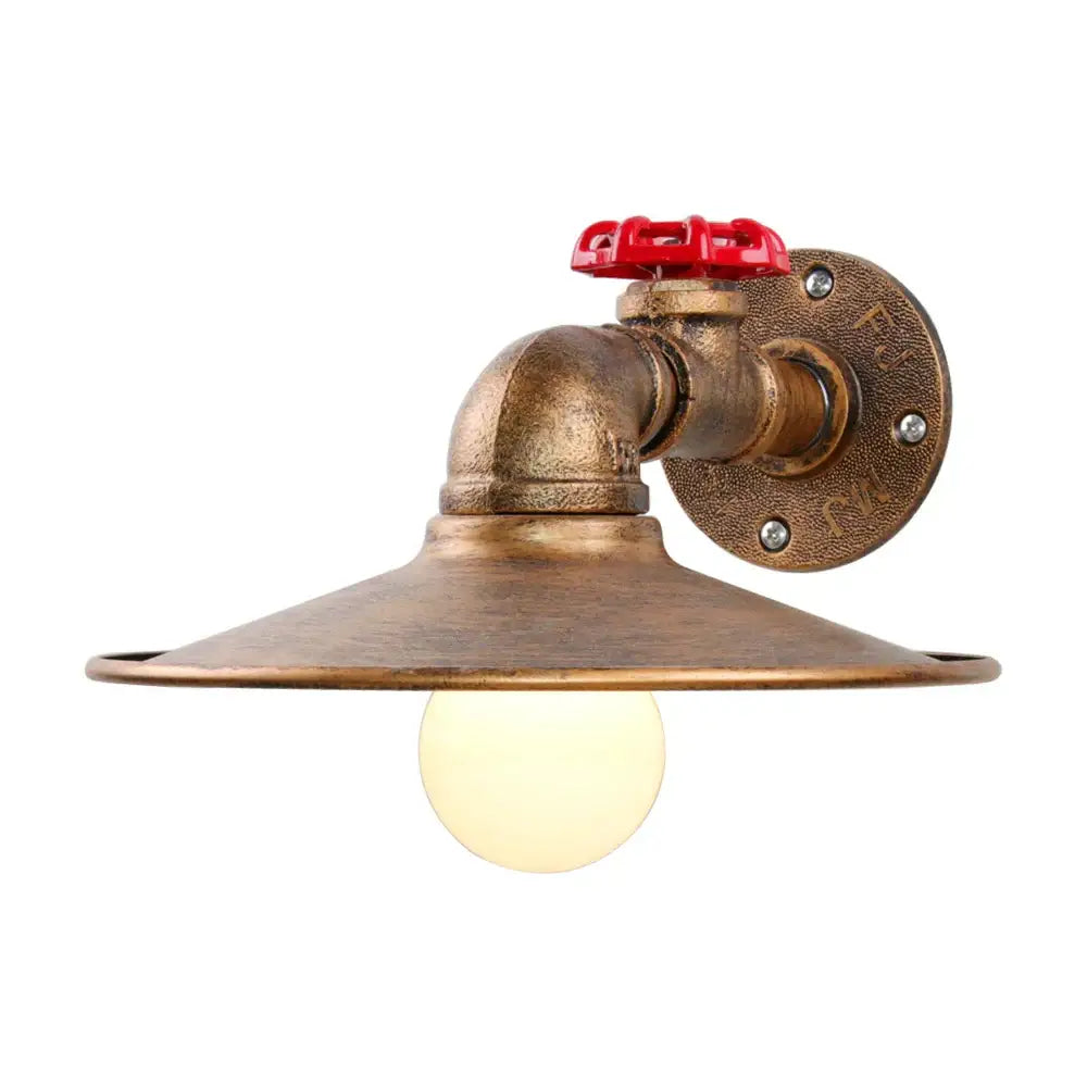Industrial iron rust wall light featuring a brass pipe sconce with a bright red handle and exposed bulb for decorbites industrial iron decor