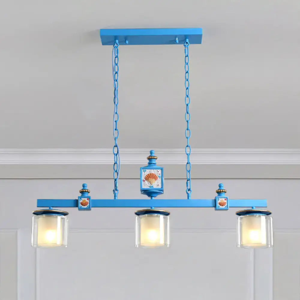 Decorbites sky blue dual cylinder parlor island pendant lamp with clear and frosted glass and shell motifs on metal fixtures