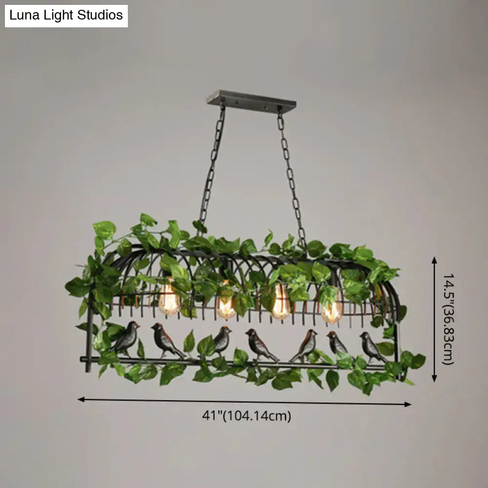 Black industrial metal pendant light with bird design, artificial green vines, five exposed edison bulbs 220v-240v 110v-120v