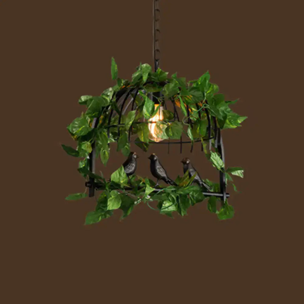 Black industrial metal pendant light cage adorned with artificial green vines and three small dark birds 220v-240v 110v-120v