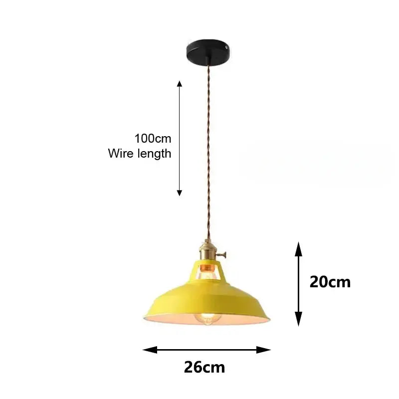 Yellow industrial pastel metal pendant light with brass finish and twisted copper wire suspension for kitchen use