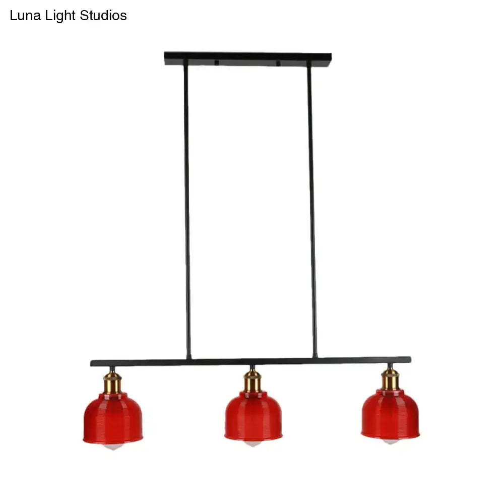 Decorbites industrial black metal pendant lamp with three vibrant red glass shades and brass accents for island lighting
