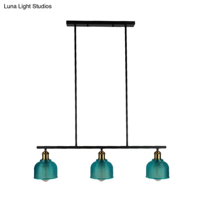 DecorBites™ industrial black pendant lamp with teal glass, brass accents, and red yellow blue bowls for island lighting