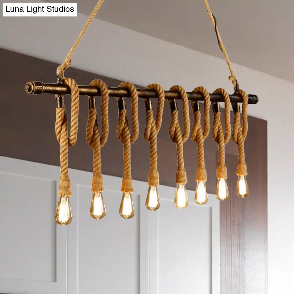 Industrial-style decorbites™ adjustable rope exposed island light with dark metal frame and light yellow filament bulbs