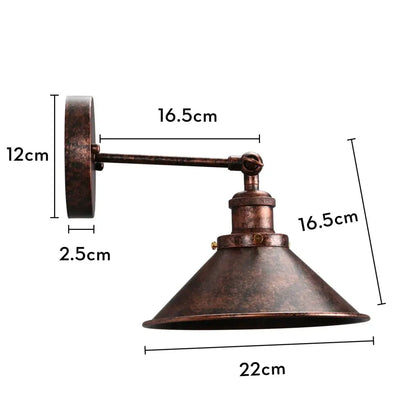 Antique bronze-finished industrial retro loft wall sconce with conical shade and articulated arm for bedroom brass accent light
