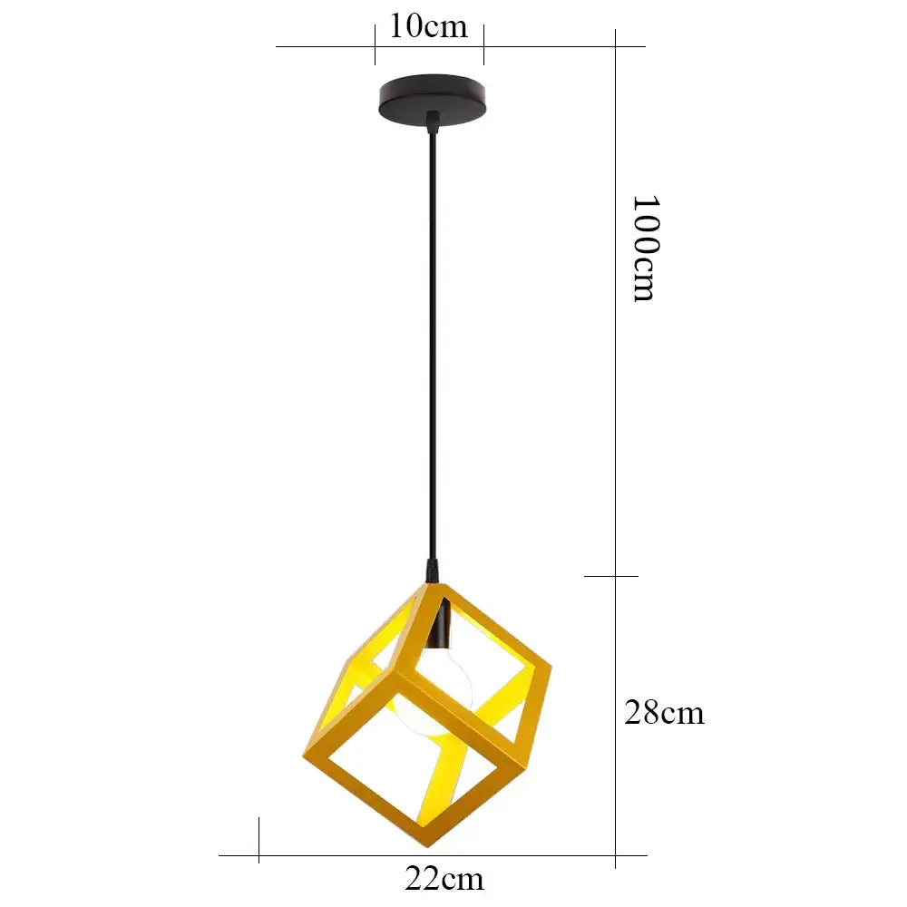 A modern geometric gold iron pendant light with open-frame cube design and black cord for kitchen dining room decorbites iron pendant
