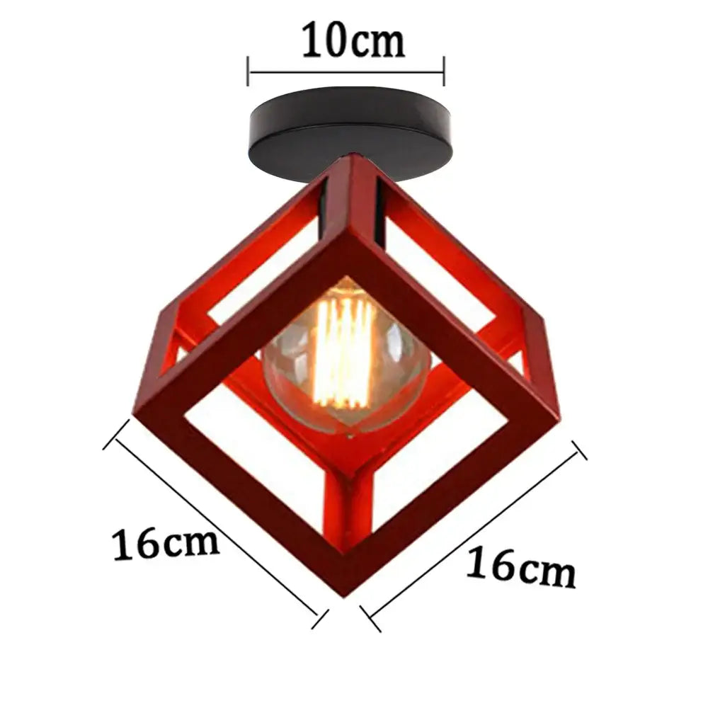 Red cube-shaped iron pendant light with black mount and exposed filament bulb for kitchen dining room decorbites iron pendant
