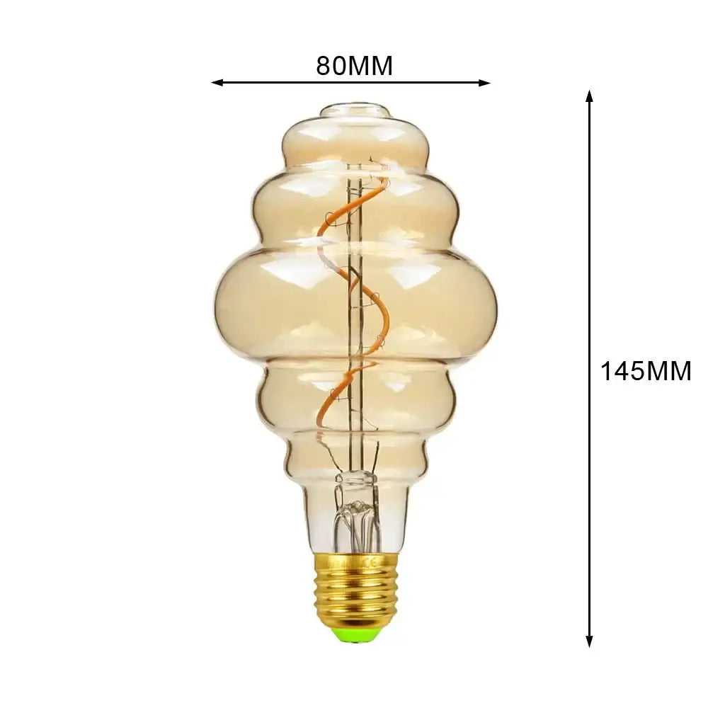 Vintage-style amber glass retro vintage led bulb with gold-toned base and coiled filament for industrial retro decorbites lighting