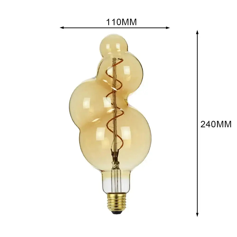 A vintage-style industrial retro vintage led edison bulb with warm amber glass and brass screw base for living room decor