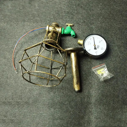 Industrial retro wall light featuring a brass cage lamp with green faucet accent and pressure gauge for living room decorbites wall light