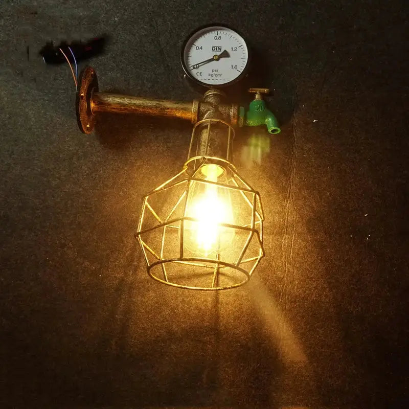 Industrial retro wall light with brass metal cage and green faucet pipe fixture for living room decorbites industrial retro