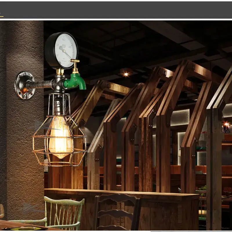 Industrial retro wall light featuring a green faucet, brass fittings, and exposed edison bulb metal cage for decorbites design