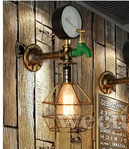Industrial retro wall light with brass piping green faucet handle and amber glowing bulb for living room decorbites wall light