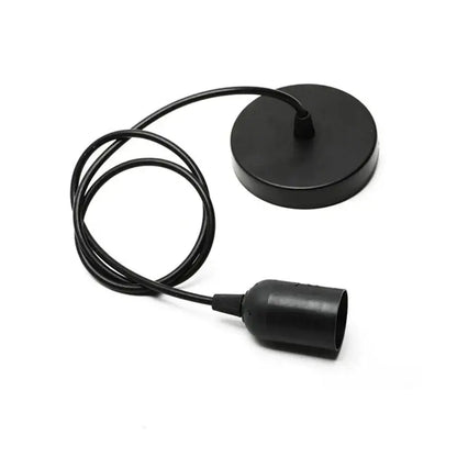 Black matte-finished led pendant lamp with circular ceiling mount and coiled cord for industrial dining room lighting
