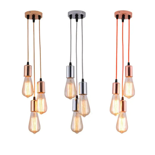 Three modern industrial rose gold and chrome led pendant lamps with exposed filament bulbs for dining room lighting