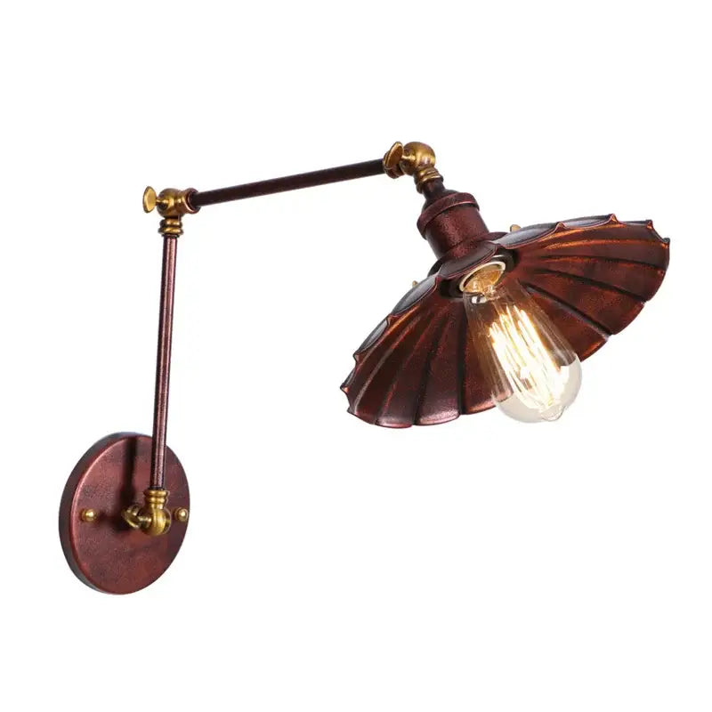A rustic copper-finished wall sconce with a fluted fan-shaped shade and exposed Edison bulb for industrial rustic LED decorbites