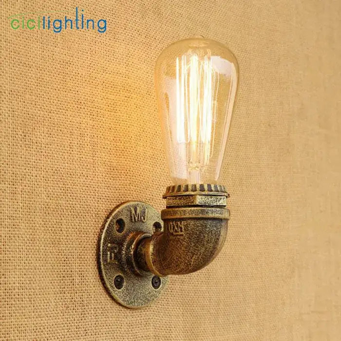 Industrial steampunk loft pipe wall lamp with brass-finished fittings and vintage edison bulb for bedroom decorbites steampunk loft