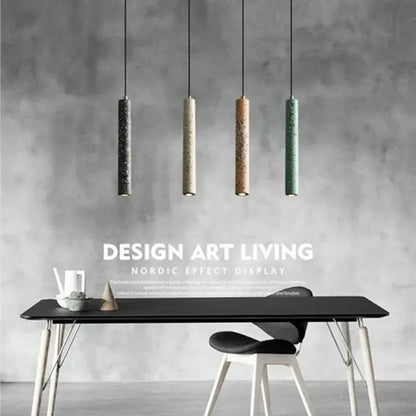 Four cylindrical decorbites industrial stone led pendant lamps in black beige terracotta and teal speckled concrete finish