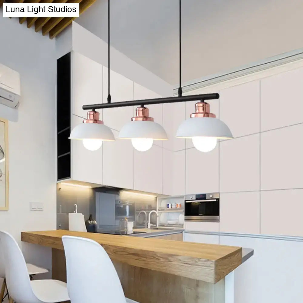 DecorBites™ industrial style three-light pendant fixture with black metal bar, rose gold accents, and white ceramic shades