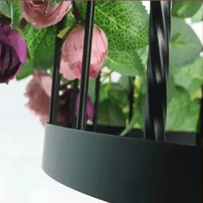 Black metal birdcage with pink and purple artificial flowers in decorbites industrial style rose chandelier pendant
