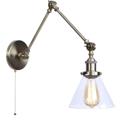 Antique brass industrial swing arm loft lamp with adjustable conical glass shade and exposed filament bulb bedroom sconce