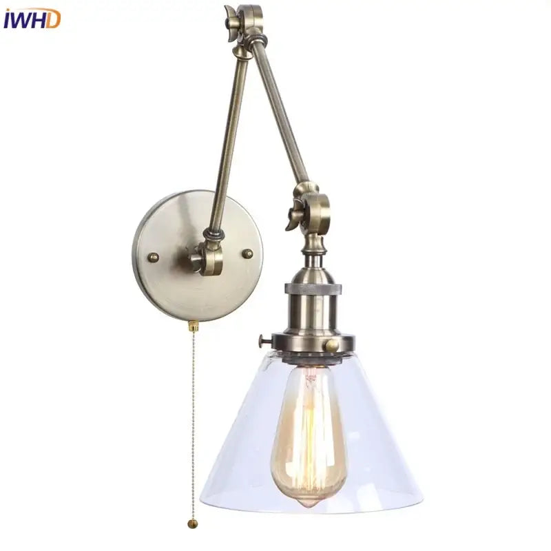 Antique brass industrial swing arm loft lamp with clear glass shade and exposed Edison bulb bedroom sconce decorbites industrial swing