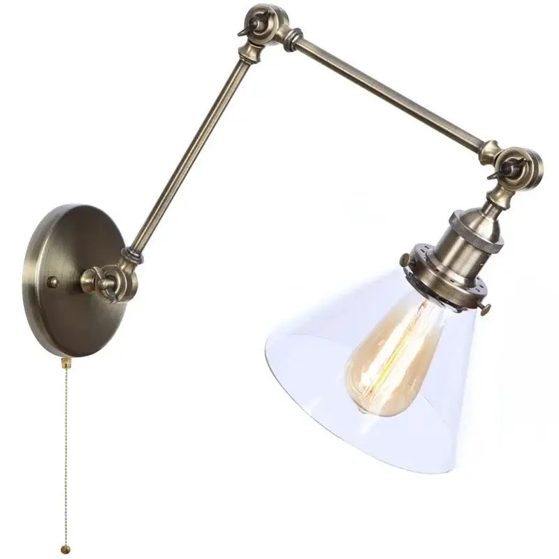 Antique brass industrial swing arm bedroom sconce with clear glass shade and exposed Edison bulb loft lamp