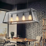 Decorbites industrial trapezoid 4-light island lamp in black with clear glass and exposed edison bulbs