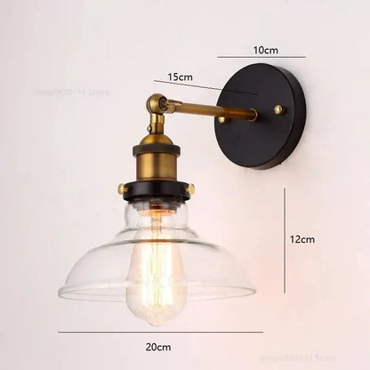 Industrial vintage black and brass wall sconce with glass dome shade and exposed Edison bulb for loft decorbites industrial vintage