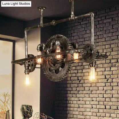 Industrial vintage black gear chandelier with dark metal pipes and exposed Edison bulbs for dining room lighting
