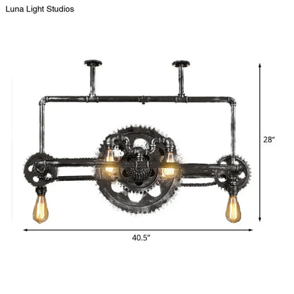 Industrial vintage black metal gear chandelier with three exposed filament Edison bulbs for dining room lighting
