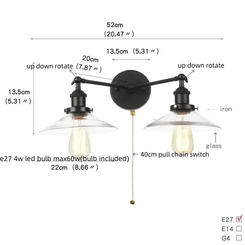 Black iron industrial vintage wall lamp with two adjustable arms and clear glass shades featuring Edison bulbs