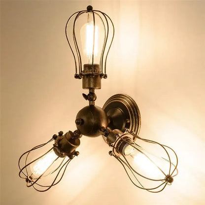 Industrial vintage black metal cage ceiling light with three exposed Edison bulbs for dining room decorbites industrial vintage