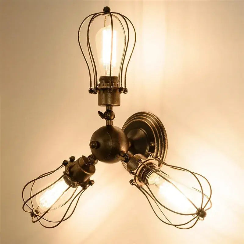 Industrial vintage black metal cage ceiling light with three exposed Edison bulbs for dining room decorbites industrial vintage