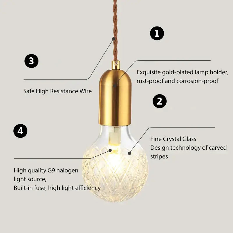 A warm-glowing intricately carved crystal glass pendant light with gold-plated holder by decorbites industrial vintage