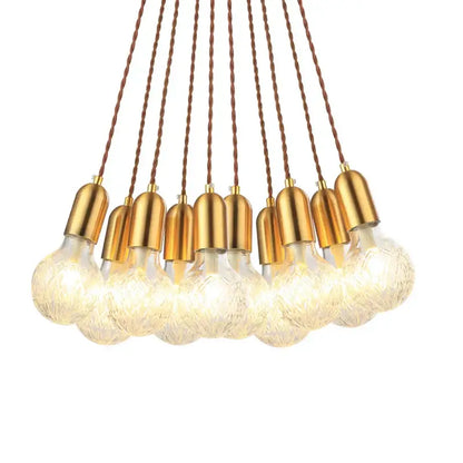 A modern decorbites industrial vintage pendant light set of 2 featuring textured glass bulbs and brass caps for dining rooms